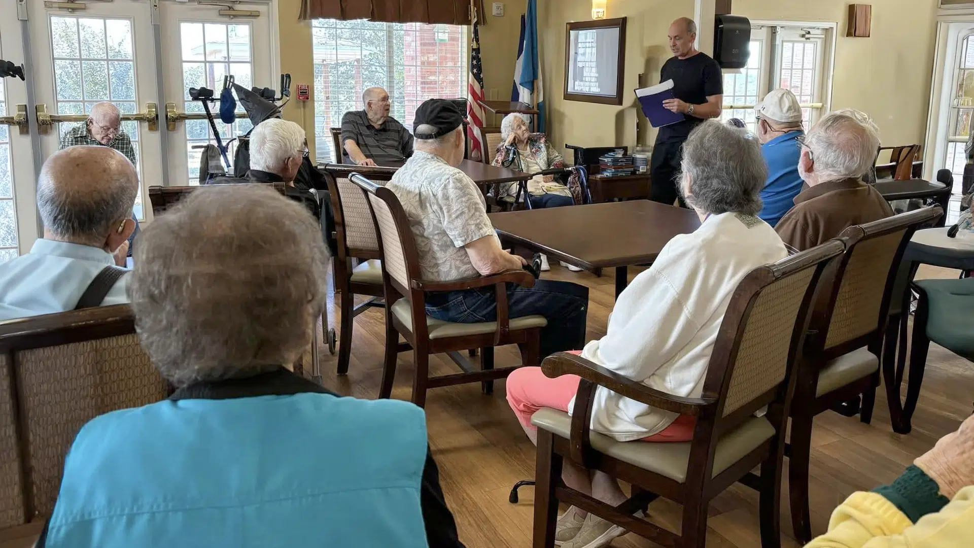 Beyond Faith Homecare community event with seniors gathered for an educational session in Graham, Texas.
