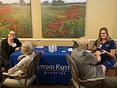 Beyond Faith Homecare team providing wellness checks and support for seniors at a community event in Texas.